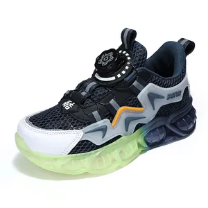 Zapatillas deportivas transpirables de malla para niños con cierre de hebilla giratoria