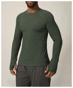 Men's dark green slim-fit sports long-sleeve top with thumbhole cuffs and raglan sleeves