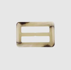 Detail view of rectangular marbled urea buckle for high-end workwear garments