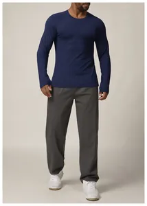 Slim fit mens long sleeve quick dry athletic shirt for gym and running training.