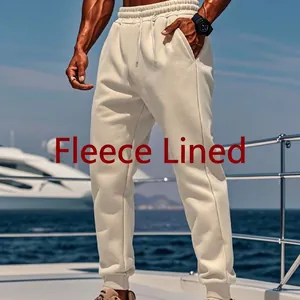 Comfortable men's solid color fleece-lined sweatpants for outdoor winter sports wear