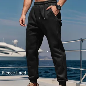 Premium men's black fleece-lined joggers for winter outdoor sports and casual wear