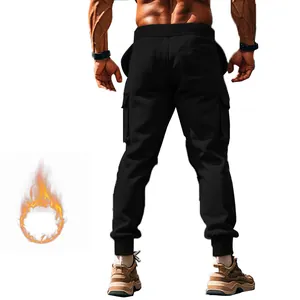 Back view of black fleece-lined men's cargo joggers with multiple pockets and ribbed cuffs