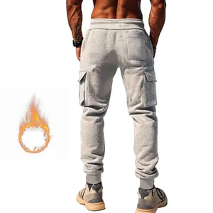 Back view of men's fleece-lined grey cargo joggers with multiple pockets for winter