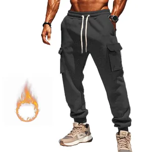 Close-up of men's heavy fleece-lined cargo joggers with drawstring waist and multi-pockets