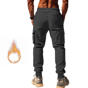 Back view detail of men's thermal fleece-lined cargo jogger pants with multiple pockets