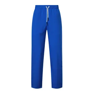 Detail view of electric blue men's casual trousers featuring an adjustable drawstring