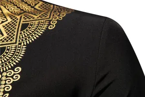 Detailed view of the intricate golden ethnic pattern print on a black men's shirt shoulder