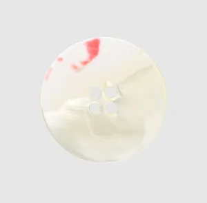 Macro detail of high-end Japanese shell button with natural red marble texture