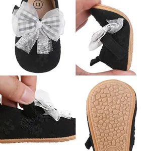 Close-up details of black baby princess walking shoes with soft non-slip rubber sole