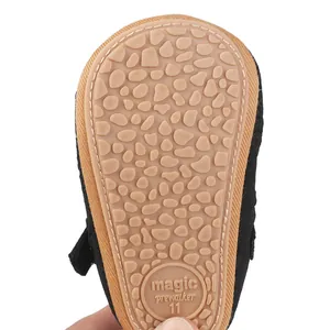 Detail view of anti-slip rubber sole for baby prewalker shoes with pebble texture