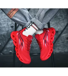 Stylish red mesh chunky sneakers for men, lightweight and breathable athletic footwear.