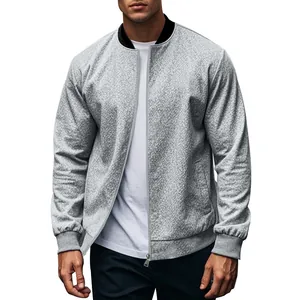 Detailed view of men's grey textured bomber jacket with black stand collar and zipper