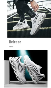 Close-up detail of white men's chunky sneakers with unique black flame pattern sole design