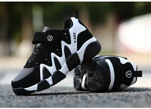 Close-up of black and white children's sneakers with durable anti-slip soles