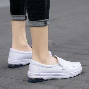 Detailed view of comfortable white slip-on nurse work shoes with air cushion sole