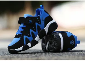 Detailed macro view of durable blue and black boys' athletic running shoes outdoor