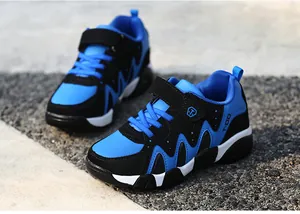 Boys athletic running shoes with durable leather upper and non-slip sole in blue and black