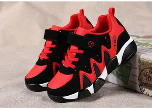 Durable red and black boys' running shoes with secure velcro straps and non-slip rubber soles