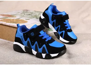 Detail view of blue and black boys' durable athletic shoes with synthetic leather