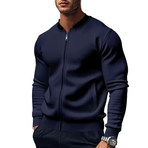 Macro view of men's navy blue stand-collar bomber jacket featuring high-quality zipper