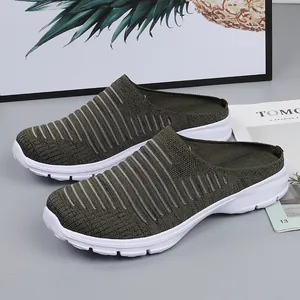 Breathable flyknit slip-on mules for outdoor travel in olive green with white soles