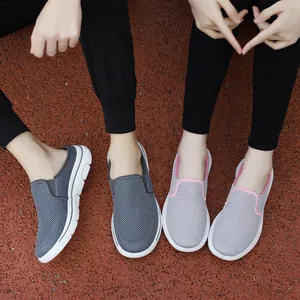 Close-up of breathable mesh mules for outdoor travel in grey and pink color options