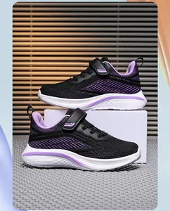 Breathable mesh girls' sneakers with purple accents and Velcro straps side view angle