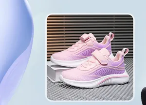 Detailed view of pink and purple breathable mesh running shoes for girls with velcro strap