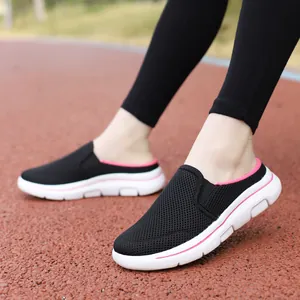 Detail view of breathable black mesh slip-on sneakers for outdoor travel