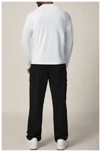 Rear view of a premium men's white long-sleeve quick-dry athletic t-shirt for fitness