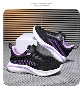 Close-up of purple and black girls sneakers with anti-collision toe guard design.