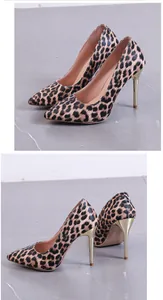 Elegant leopard print pointed toe pumps featuring sleek metallic gold stiletto heels