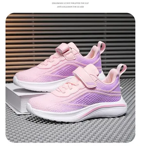 Close-up of pink and purple breathable mesh running shoes for girls with velcro strap