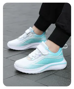 Stylish girls' athletic sneakers with breathable mesh in white and cyan, detail on feet