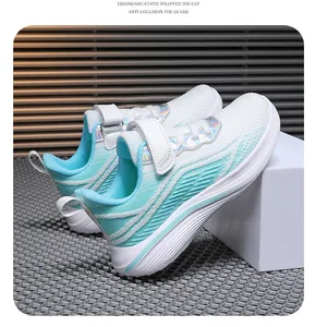 Detailed side view of breathable blue and white girls' running shoes for ages 6-12