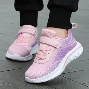 Stylish pink breathable mesh running shoes for girls with velcro strap and white sole.