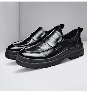 Premium black genuine leather penny loafers for men featuring a modern thick lug sole design