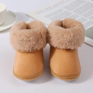 Detailed front view of warm khaki baby winter boots with fluffy faux fur