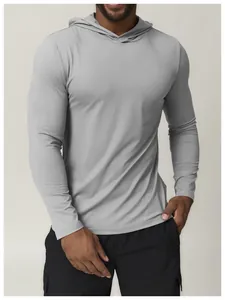 Close-up detail of men's athletic quick-dry hooded long-sleeve shirt in light grey