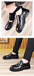 Classic men's black leather loafers with a smooth finish for business and formal wear.
