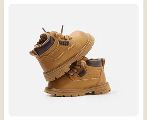 Vue détaillée de bottines Martin jaunes pour enfants avec semelles antidérapantes