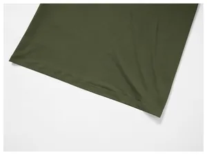 Detail view of the durable hem and stitching on a men's olive green quick-dry long-sleeve top.