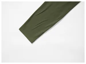 Close-up detail of the cuff of an olive green quick-dry sports long sleeve shirt