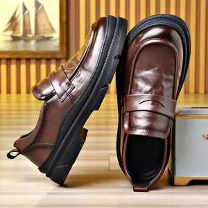 Elegant brown leather penny loafers for men, premium business casual shoes with thick soles