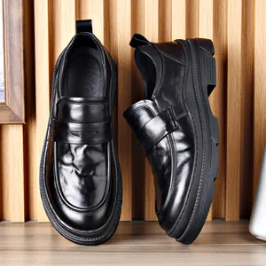Men's premium black leather penny loafers for business casual and wedding attire.