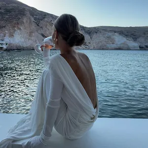 Elegant white backless long sleeve maxi dress with cowl back detail for formal parties