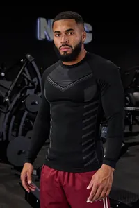 Detail of men's slim fit long sleeve gym shirt with chevron print on chest area