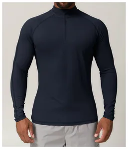 T-shirt de sport à manches longues et quart de zip bleu marine pour homme actif