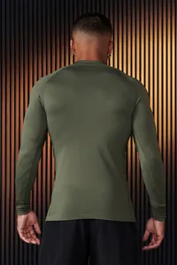 Detailed back view of men's olive green slim fit long-sleeve athletic compression shirt